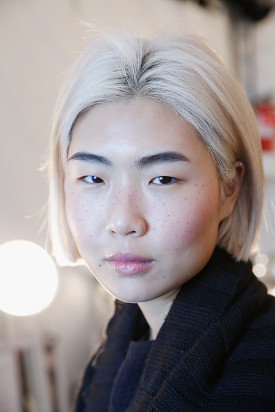 A model poses backstage at the Sandy Liang presentation during Fall 2016 MADE Fashion Week at The Standard on February 14, 2016 in New York City.jpg